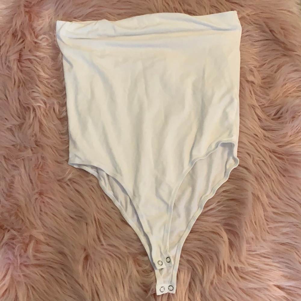 White strapless bodysuit.